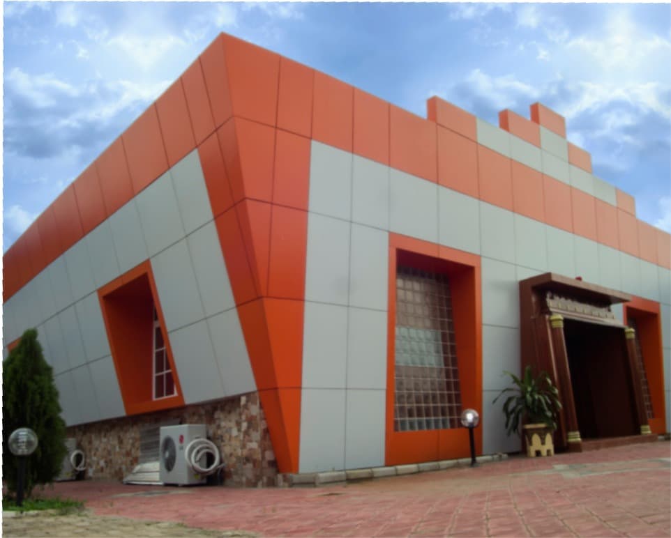 The orange exterior of JJAG Event Centre